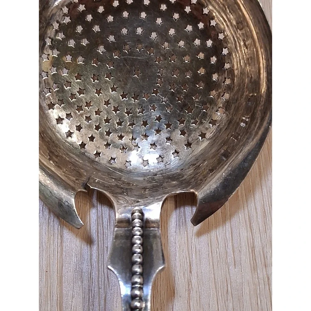 WOOD & HUGHES pierced Serving Ladle / Sifter MEDALLION 3D face. Rare 1870s